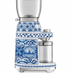 This SMEG Dolce & Gabbana Coffee Grinder, Blu Mediterraneo boasts 30 levels that allow you to customize the grind for your favorite brewing method,