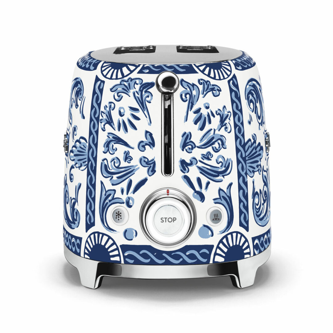 SMEG Dolce & Gabbana 2-Slice Toaster, Blu Mediterraneo. This two-slice toaster has six browning levels to help you toast bread to your exacting desire!